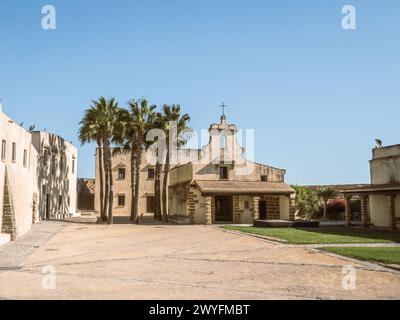 Chapel with palm trees in the fortress of Santa Catalina in Cadiz (Castillo de Santa Catalina), Spain, Andalusia. Stock Photo