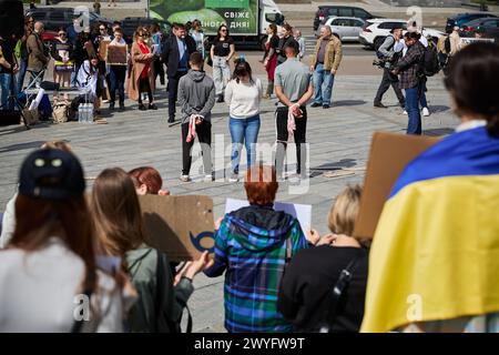 Art performance in Ukraine. Actors play captured civilians held in russian prisons. Kyiv - 6 April,2024 Stock Photo