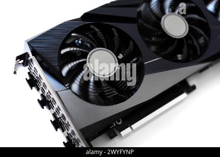 A black and white video card on a white background. Fans and the graphics card case. Computer accessories. Stock Photo
