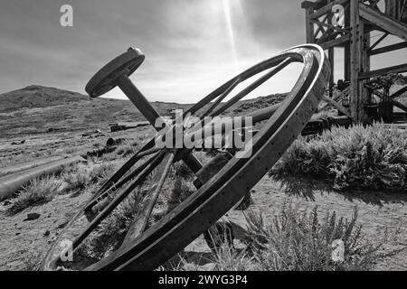 Giant Flywheel of a Mining Machine of an Abandoned Goldmine, Bodie, California Stock Photo