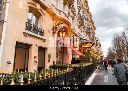 Paris, France - January 20, 2022: Ornate entrance of Plaza Athenee Hotel in Paris, France. Stock Photo