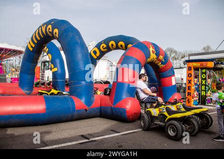 Reims France April 6, 2024 Funfair with its colorful stands located in ...