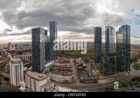 The Sunrises over Deansgate Square, a residential skyscraper cluster on the southern edge of Manchester City Centre, UK They are called, North, West, Stock Photo