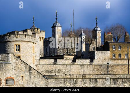 External view of walls and towers of Tower of London under dark sky Stock Photo