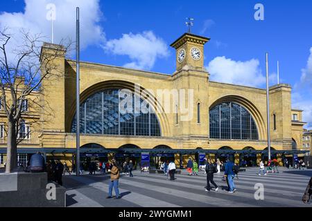 London, UK - March 23, 2024; Front of King Cross railway station at London terminus with travellers Stock Photo