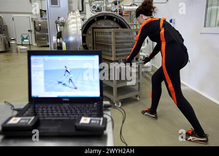 Researcher wearing a full body suit ´Ergomoven´ designed specifically ...