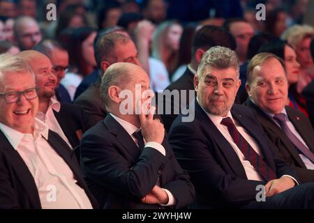 Bucharest, Romania. 6th Apr, 2024: Olaf Scholz (C-L), Chancellor of Germany, and Marcel Ciolacu (C-R), Prime Minister of Romania and president of Social Democratic Party (PSD), attend the Party of European Socialists (PES) conference 'We stand together - for our Europe!', held at the Palace of the Romanian Parliament. Credit: Lucian Alecu/Alamy Live News Stock Photo