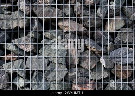 Stone and Metal Mesh Fusion: Textured Background Stock Photo