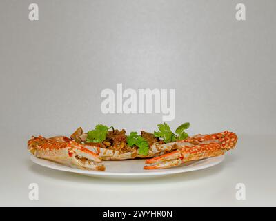 Crab Pepper Fry Cooked In Indian Style Topping With Green Fresh 