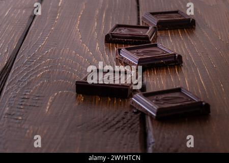 Chocolate bar pieces. Background with chocolate. Sweet food photo concept. Stock Photo