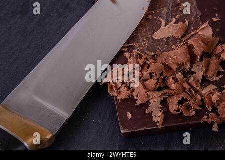 Chocolate bar pieces. Background with chocolate. Sweet food photo concept. Stock Photo
