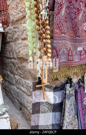 Easter concept. Wood rosary with the cross with inscription Jerusalem. The best souvenir from Holy Land Stock Photo