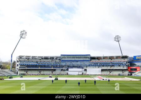 Birmingham, UK. 07th Apr, 2024. A view of the ground as ground staff begin the process of removing covers used over night to protect the playing service from the effects of Storm Kathleen taken during Day 3 of the Vitality County Championship Division 1 match between Warwickshire CCC and Worcestershire CCC at Edgbaston Cricket Ground, Birmingham, England on 7 April 2024. Photo by Stuart Leggett. Editorial use only, license required for commercial use. No use in betting, games or a single club/league/player publications. Credit: UK Sports Pics Ltd/Alamy Live News Stock Photo