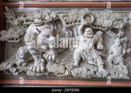 Intricate Stone Wall Carving Depicting Mythological Figures And Motifs 