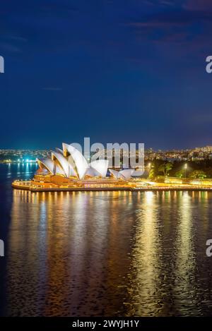 Sydney, New South Wales, Australia, 07 April, 2024 ; The Sydney Opera House and skyline illuminated at night. Stock Photo