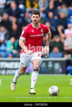 Wrexham's Thomas O'Connor during the Sky Bet League Two match at JobServe Community Stadium, Colchester. Picture date: Saturday April 6, 2024. Stock Photo