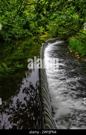 Weir on the river Wye in Monsal Dale in the Peak District in Derbyshire, England Stock Photo