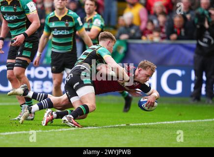 Munster’s Mike Haley dives over to score his side's second try during the ECPR Challenge Cup match at cinch Stadium at Franklin's Gardens, Northampton. Picture date: Sunday April 7, 2024. Stock Photo