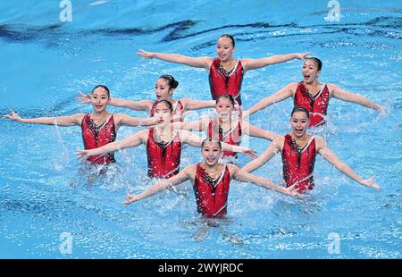 Beijing, China. 7th Apr, 2024. The team of China's Hong Kong compete during the team acrobatic final at World Aquatics Artistic Swimming World Cup 2024 in Beijing, China, April 7, 2024. Credit: Xia Yifang/Xinhua/Alamy Live News Stock Photo