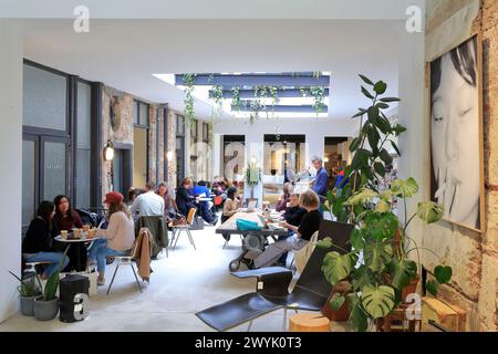 Belgium, Flanders, Antwerp, St. Vincents is a concept store installed in a former printing house, coffee shop Stock Photo