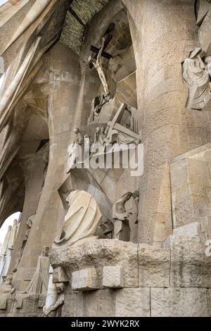 Spain, Catalonia, Barcelona, Eixample district, Sagrada Familia basilica by Catalan modernist architect Antoni Gaudi, listed as a UNESCO World Heritage Site, the passion facade whose sculptures were made by Josep Maria Subirachs, crucifixion and ordeal Stock Photo