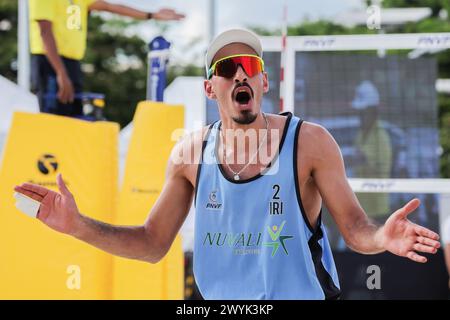 Laguna Province, Philippines. 7th Apr, 2024. Alireza Aghajanighasab celebrates scoring during the men's final match between Abbas Pourasgari/Alireza Aghajanighasab of Iran and Pithak Tipjan/Poravid Taovato of Thailand at the Asian Volleyball Confederation (AVC) Beach Volleyball Tour Nuvali Open in Laguna Province, the Philippines, on April 7, 2024. Credit: Rouelle Umali/Xinhua/Alamy Live News Stock Photo