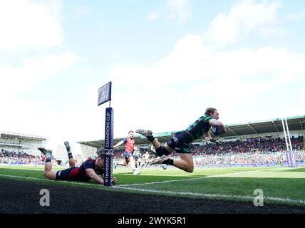 Northampton Saints' George Hendy dives over to score his side's third try during the ECPR Challenge Cup match at cinch Stadium at Franklin's Gardens, Northampton. Picture date: Sunday April 7, 2024. Stock Photo