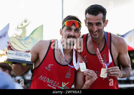 Laguna Province, Philippines. 7th Apr, 2024. Men's gold medalists Alireza Aghajanighasab/Abbas Pourasgari (R) of Iran pose with their trophy and medals during the awarding ceremony of the Asian Volleyball Confederation (AVC) Beach Volleyball Tour Nuvali Open in Laguna Province, the Philippines, on April 7, 2024. Credit: Rouelle Umali/Xinhua/Alamy Live News Stock Photo