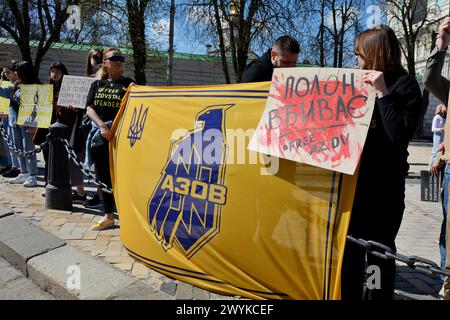 People stand with placards during action 'Don't Be Silent. Captivity Kills' on April 07, 2024 in Kyiv, Ukraine. Credit: SOPA Images Limited/Alamy Live News Stock Photo