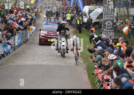 France. 07th Apr, 2024. © PHOTOPQR/VOIX DU NORD/Florent MOREAU ; 07/04/2024 ; Gruson, le 06/04/2024. Mathieu Van der Poel franchit le carrefour de l'Arbre, secteur pave n4, lors du Paris Roubaix. PHOTO FLORENT MOREAU LA VOIX DU NORD Dutch Mathieu van der Poel of Alpecin-Deceuninck won the men's elite race of the 'Paris-Roubaix' cycling race on april 7th 2024 Credit: MAXPPP/Alamy Live News Stock Photo