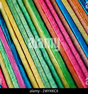Multi colored wooden craft sticks, colorful background Stock Photo