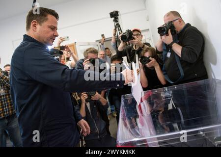 Rafal Trzaskowski, Mayor of Warsaw who is seeking a second term, casts his vote at the polling station in Warsaw. Voters across Poland are casting ballots in local elections in the first electoral test for the coalition government of PM Donald Tusk nearly four months since it took power. Voters elected mayors as well as members of municipal councils and provincial assemblies. Among those running is Rafal Trzaskowski - Mayor of Warsaw, a Tusk ally who is seeking a second term. Opinion polls showed the two largest political formations running neck-and-neck: Tusk's Civic Coalition, an electoral Stock Photo