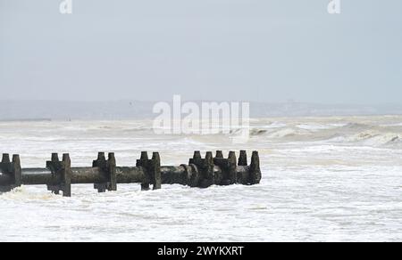The Southern Water sea outfall pipe at Lancing beach on the Sussex coast between Worthing and Brighton , UK Stock Photo