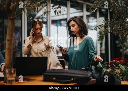 Startup business team mates working on new project at a coffee bar Stock Photo