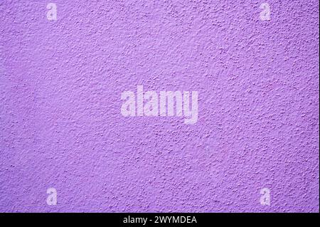 Purple colored cement wall texture background. Stock Photo