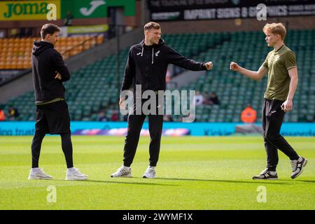 Christian Fassnacht of Norwich City, Sydney Van Hooijoonk of Norwich City and Henry Bullen of Norwich City is seen before the Sky Bet Championship match between Norwich City and Ipswich Town at Carrow Road, Norwich on Saturday 6th April 2024. (Photo: David Watts | MI News) Credit: MI News & Sport /Alamy Live News Stock Photo