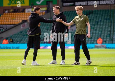 Christian Fassnacht of Norwich City, Sydney Van Hooijoonk of Norwich City and Henry Bullen of Norwich City is seen before the Sky Bet Championship match between Norwich City and Ipswich Town at Carrow Road, Norwich on Saturday 6th April 2024. (Photo: David Watts | MI News) Credit: MI News & Sport /Alamy Live News Stock Photo