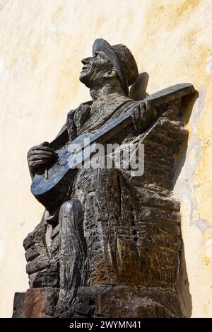 Statue of Karel Hašler (Czech songwriter, actor, lyricist, film and theatre director) in Prague, Czech Republic Stock Photo