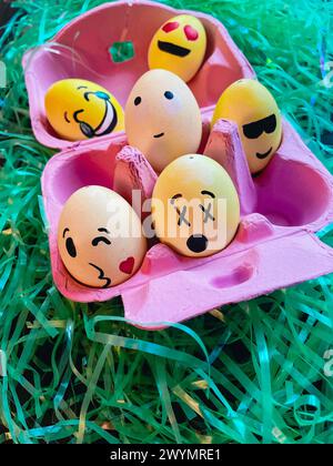 Basket of Hand Decorated Easter Egg Emojis, 2024, USA Stock Photo