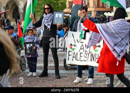 Grass root protest demonstration against Benjamin Netanyahu and IDF-led genocide of Palestinian civilians in Gaza held on Main Market Square and next Stock Photo