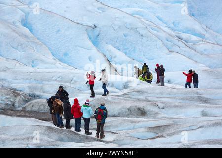 Mini trekking. Walk on the glacier with crampons. Perito Moreno glacier. Los Glaciares National Park. Near EL Calafate. Santa Cruz province. Patagonia. Argentina. Stock Photo