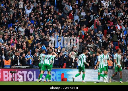 London, UK. 07th Apr, 2024. GOAL: Dale Taylor of Wycombe Wanderers scores and Wycombe Wanderers fans celebrate during the EFL Trophy Final between Peterborough United and Wycombe Wanderers at Wembley Stadium, London, England on 7 April 2024. Photo by Carlton Myrie. Editorial use only, license required for commercial use. No use in betting, games or a single club/league/player publications. Credit: UK Sports Pics Ltd/Alamy Live News Stock Photo