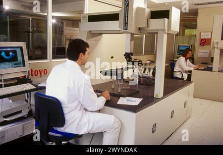 High precision metrology, coordinate measuring machine, plastic car engine component. Stock Photo