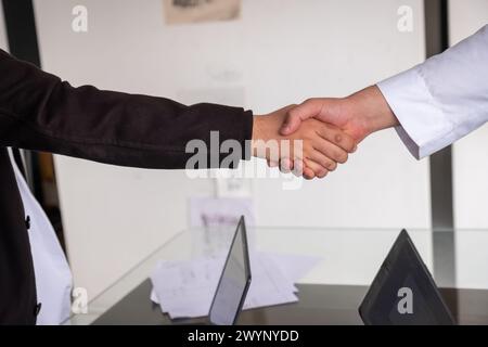 Arab shaking hands friendly and lovely Stock Photo