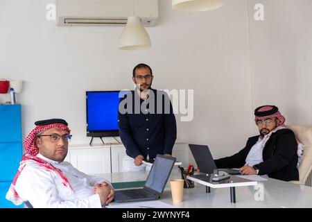 Supporting helping and assess your colleagues makes friendly atmosphere at work area and enhance the relations between employees Stock Photo
