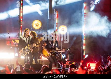 American country rock band NEEDTOBREATHE with lead singer BEAR RINEHART (right) and bass player SETH BOLT (left) perform at a taping of CMT Country Crossroads on the University of Texas campus on April 5, 2024.  Credit: Bob Daemmrich/Alamy Live News Stock Photo