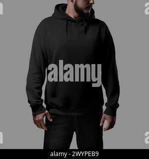 Template of a black oversized hoodie on a bearded man, for design, branding, advertising, front. Casual clothing mockup with laces, cuffs, pocket, hoo Stock Photo
