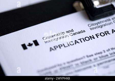 Citizenship and Immigration Canada inscription and small canadian flag close up Stock Photo