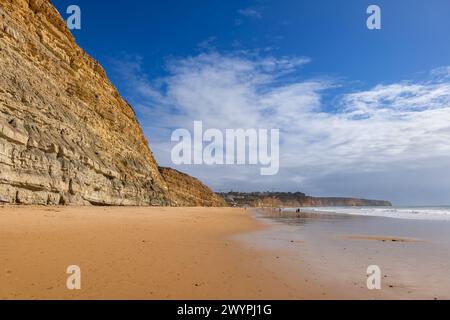 Praia de Porto Mos sandy beach and cliff in Lagos, resort town on Algarve coast in Faro District, southern Portugal. Stock Photo