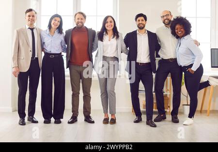 Business portrait, successful group of businesspeople in modern office looking at camera Stock Photo